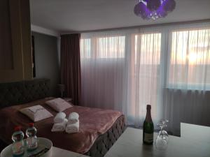 Ένα ή περισσότερα κρεβάτια σε δωμάτιο στο Apartament Wyzwolenia