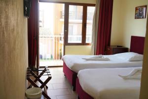 Posteľ alebo postele v izbe v ubytovaní Das Hostal