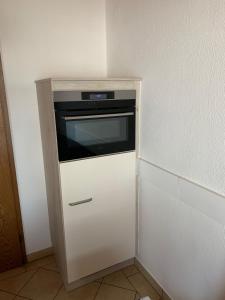 Kuchyň nebo kuchyňský kout v ubytování Ferienhäuser Wede