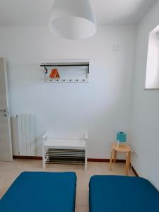 A bed or beds in a room at Mondello Sabrina Apartments