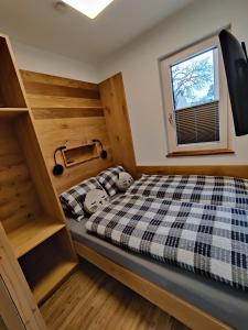 A bed or beds in a room at DaHome Appartements