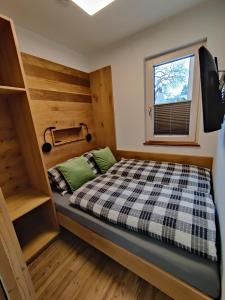 A bed or beds in a room at DaHome Appartements