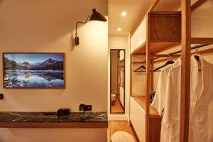 a bathroom with a sink and a mirror at Regno Di Morea in Nafplio