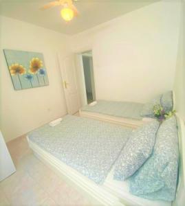Cama o camas de una habitación en Bliss Apartments
