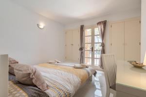 Posteľ alebo postele v izbe v ubytovaní Porto Cari 9 Apart Marina Cala dor