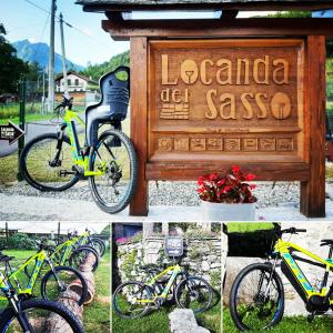 a group of bikes parked in front of a sign at Locanda del Sasso Rooms in Crodo