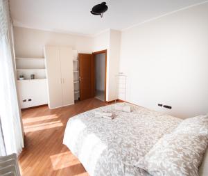 A bed or beds in a room at SIUM'S APARTMENT