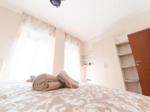 A bed or beds in a room at SIUM'S APARTMENT