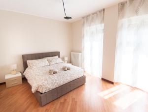 A bed or beds in a room at SIUM'S APARTMENT