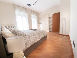 A bed or beds in a room at SIUM'S APARTMENT