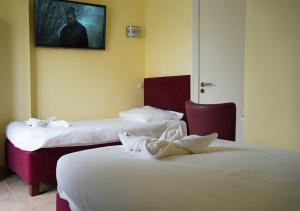 Posteľ alebo postele v izbe v ubytovaní Das Hostal + 30 fotografií
