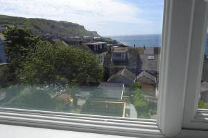 a view of a city from a window at Cuddy in Castletown
