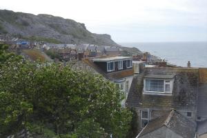 a view of the ocean from the roofs of houses at Cuddy in Castletown