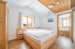 Posteľ alebo postele v izbe v ubytovaní Ferienhaus Lorenzin