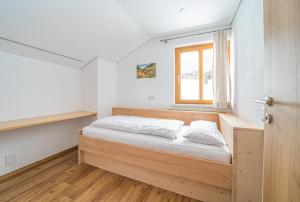 Posteľ alebo postele v izbe v ubytovaní Ferienhaus Lorenzin