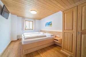 Posteľ alebo postele v izbe v ubytovaní Ferienhaus Lorenzin