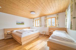 Posteľ alebo postele v izbe v ubytovaní Ferienhaus Lorenzin