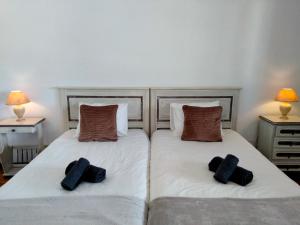 Postel nebo postele na pokoji v ubytování Vila Horizonte