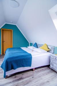 Postel nebo postele na pokoji v ubytování Hotel Blischke