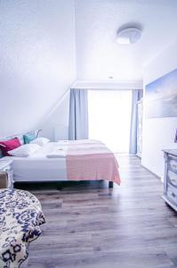 Postel nebo postele na pokoji v ubytování Hotel Blischke