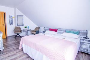 Postel nebo postele na pokoji v ubytování Hotel Blischke