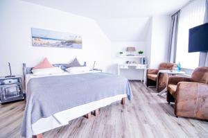 TV a/nebo společenská místnost v ubytování Hotel Blischke