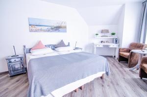 Postel nebo postele na pokoji v ubytování Hotel Blischke