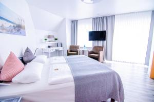 TV a/nebo společenská místnost v ubytování Hotel Blischke