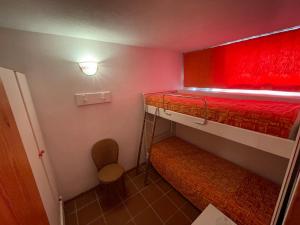 Tempat tidur susun dalam kamar di Appartamento vista mare a Tanca Manna - Cannigione