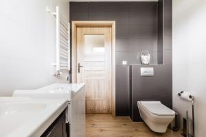 Kúpeľňa v ubytovaní Apartamenty Parzenica Zakopane