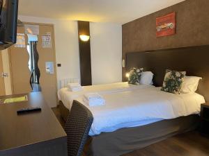 Postel nebo postele na pokoji v ubytování SHELDER Hôtel - CHERBOURG EN COTENTIN - Equeurdreville
