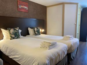 Postel nebo postele na pokoji v ubytování SHELDER Hôtel - CHERBOURG EN COTENTIN - Equeurdreville
