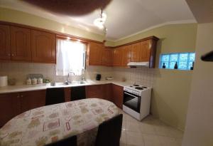 Kuchyň nebo kuchyňský kout v ubytování Little house + 1 fotografie