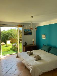 Postel nebo postele na pokoji v ubytování Gîte dans villa méditerranéenne