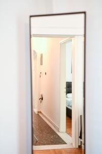 A bed or beds in a room at Thessaloniki City Apartment Center