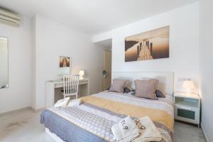 Posteľ alebo postele v izbe v ubytovaní Porto Cari 9 Apart Marina Cala dor