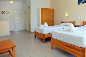 Ένα ή περισσότερα κρεβάτια σε δωμάτιο στο The Student & Travellers Inn