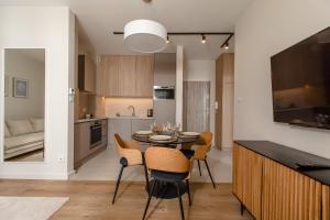 Kuchyňa alebo kuchynka v ubytovaní Resort Apartamenty Klifowa Rewal 79