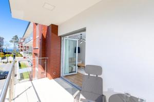 Balkón alebo terasa v ubytovaní Resort Apartamenty Klifowa Rewal 79