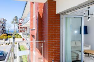 Balkón alebo terasa v ubytovaní Resort Apartamenty Klifowa Rewal 79