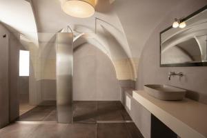 Ett badrum på Palazzo dei Tolomei