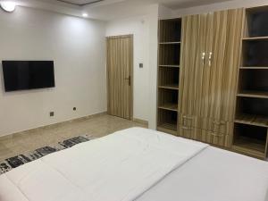 Llit o llits en una habitació de Weena Hotel & Resort