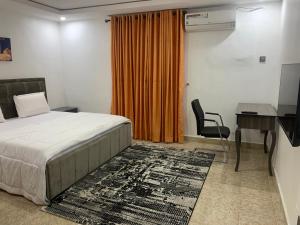 Llit o llits en una habitació de Weena Hotel & Resort