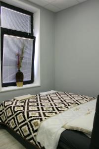 Postel nebo postele na pokoji v ubytování Hostel 42