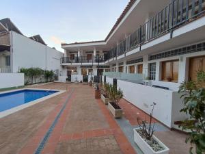 an image of a house with a swimming pool at Apartamento Exclusivo - María 7 in Benaoján