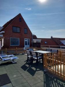 Балкон или терраса в 105,4 appartement 200m van strand