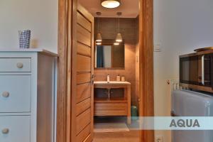 Kuchyň nebo kuchyňský kout v ubytování DV Premium Apartments