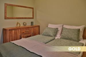 Postel nebo postele na pokoji v ubytování DV Premium Apartments