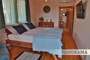 TV a/nebo společenská místnost v ubytování DV Premium Apartments