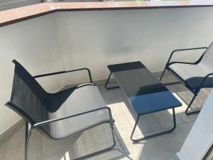 a group of chairs and a table in a room at Villa Mara in Pula